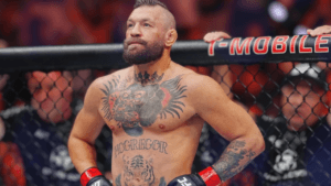 Conor McGregor visita a AOJ, arte de capa do BJJ Girls Mag